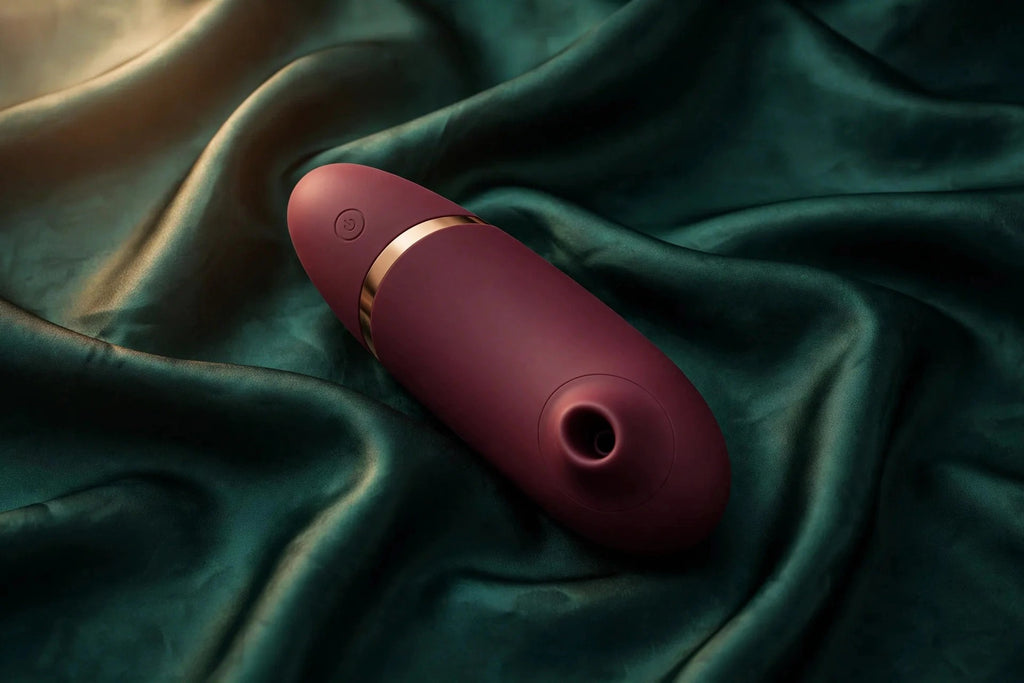 Womanizer Next Bordeaux — satin view
